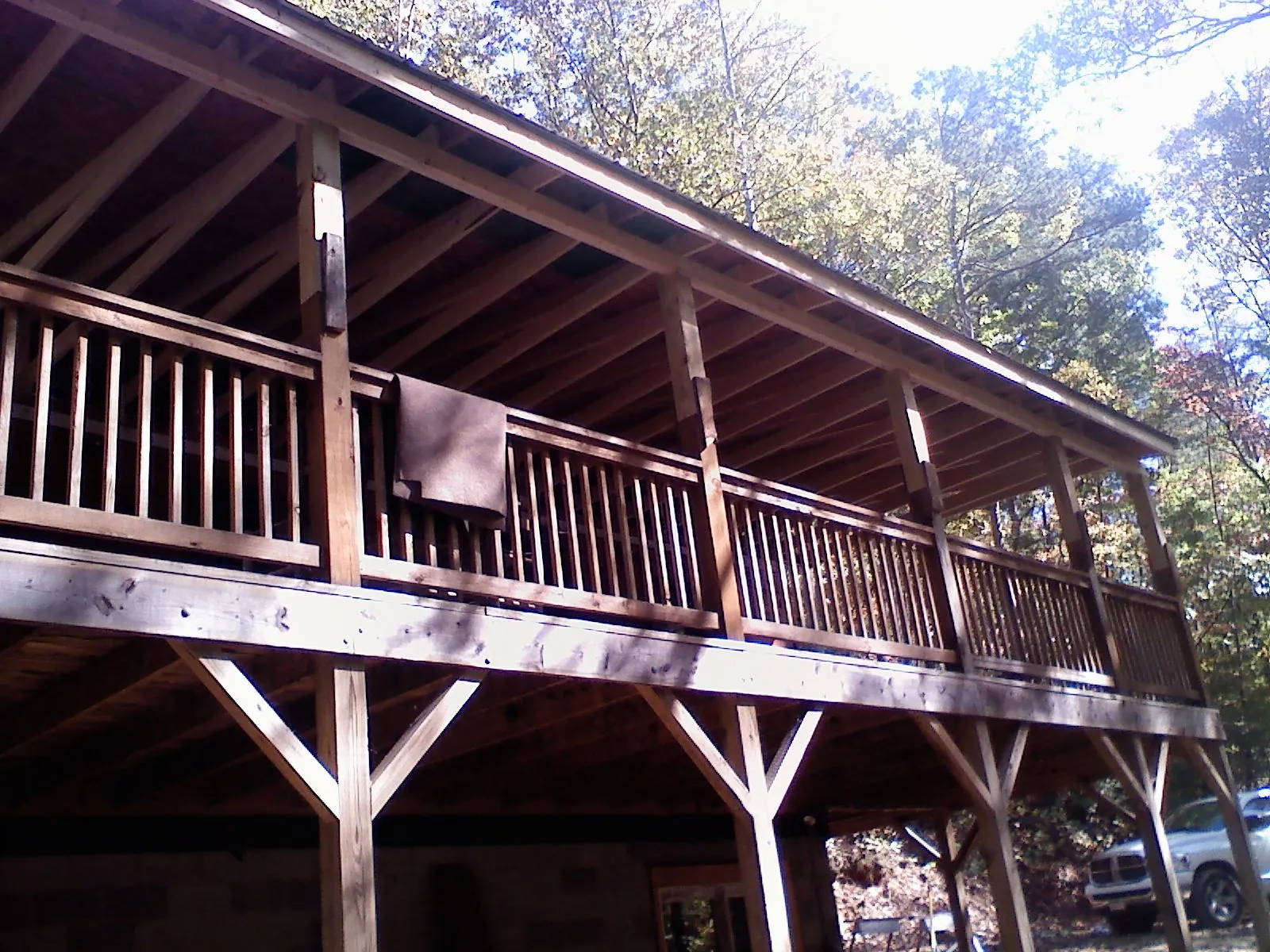 Timber framing under a new elevated porch and deck — Roof Leak Repair in Kaneville by Roofing Brothers